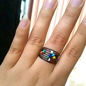 Multi color black band ring